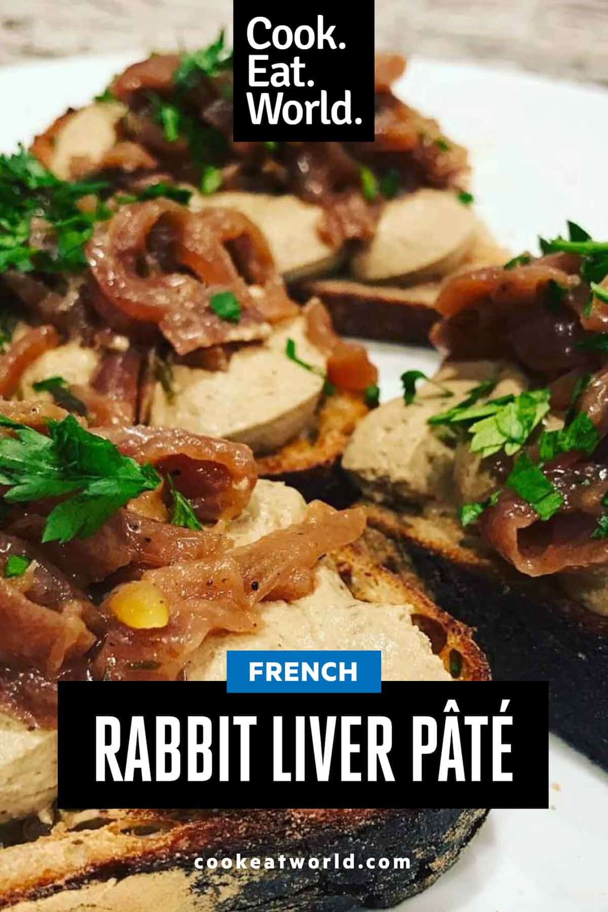 Rabbit liver pate spread on sourdough toast. Topped with caramelised onions and fresh parsley