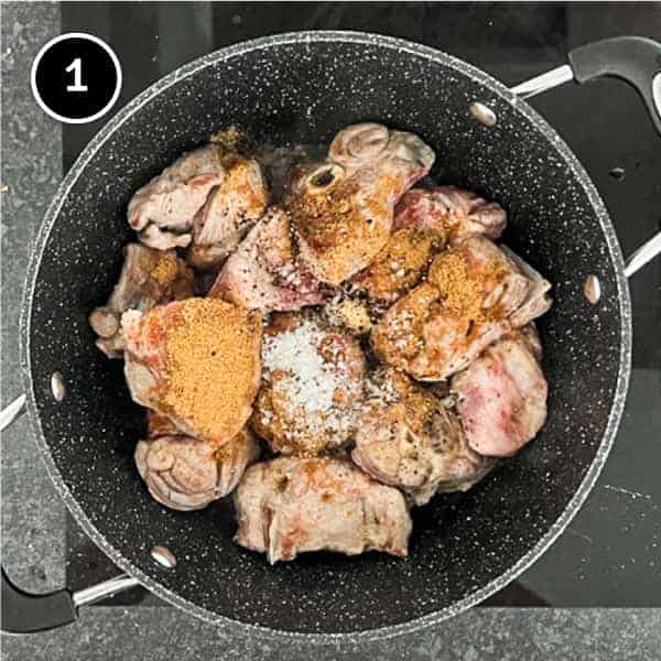 Cumin and salt is added to the browned lamb