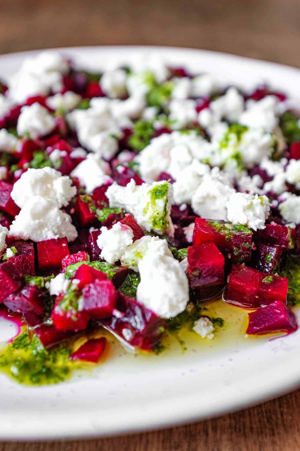 A platter of beetroot & feta salad with a herb dressing