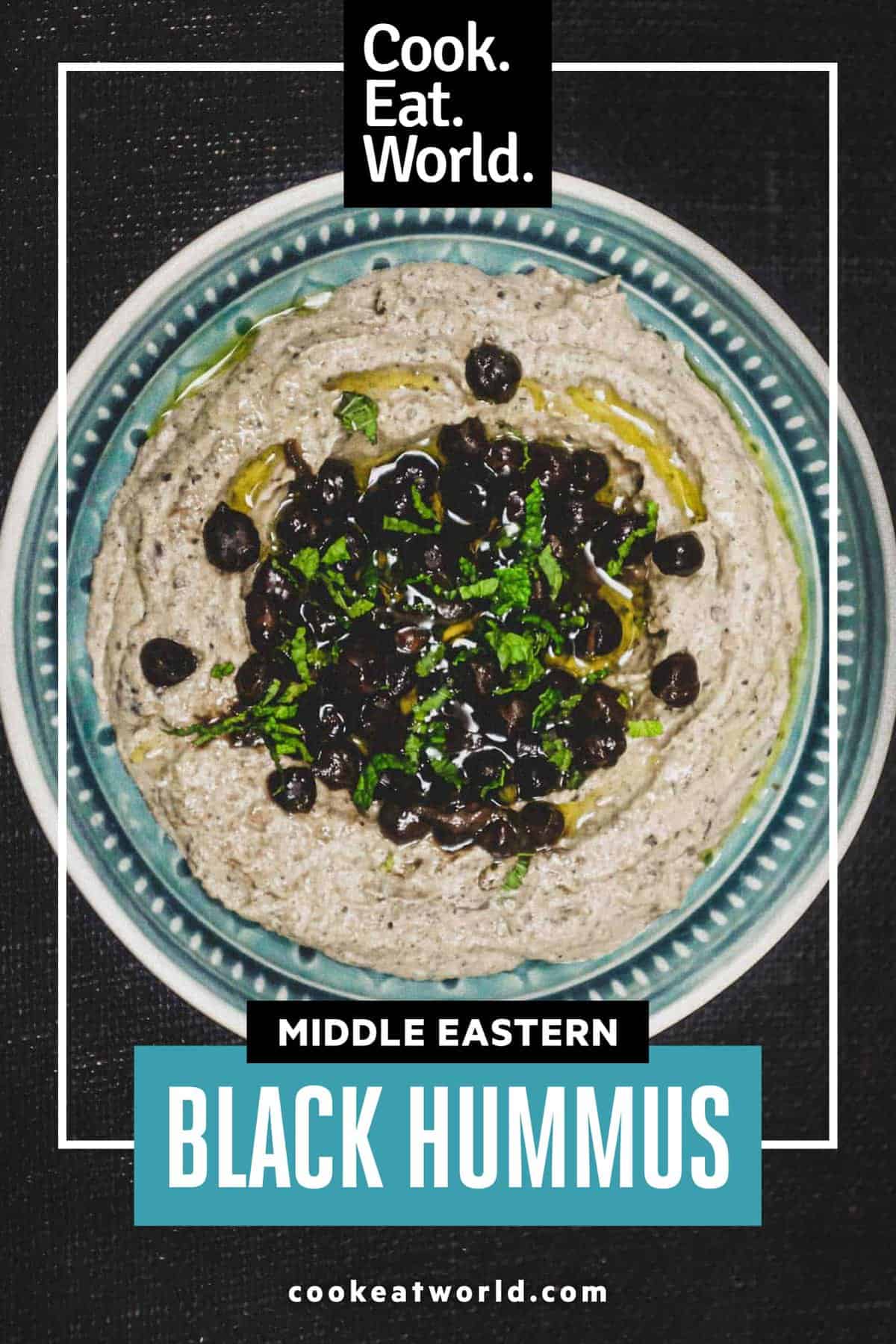 A bowl of black hummus made with black chickpeas