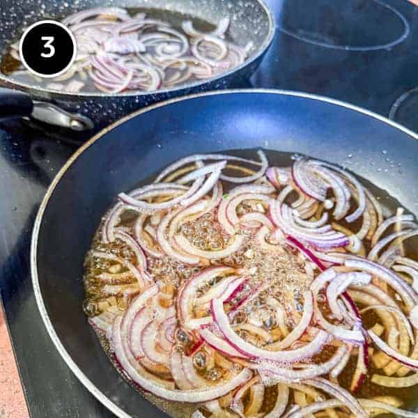 Chicken Katsudon | cookeatworld.com Onions braising in soy sauce for katsudon