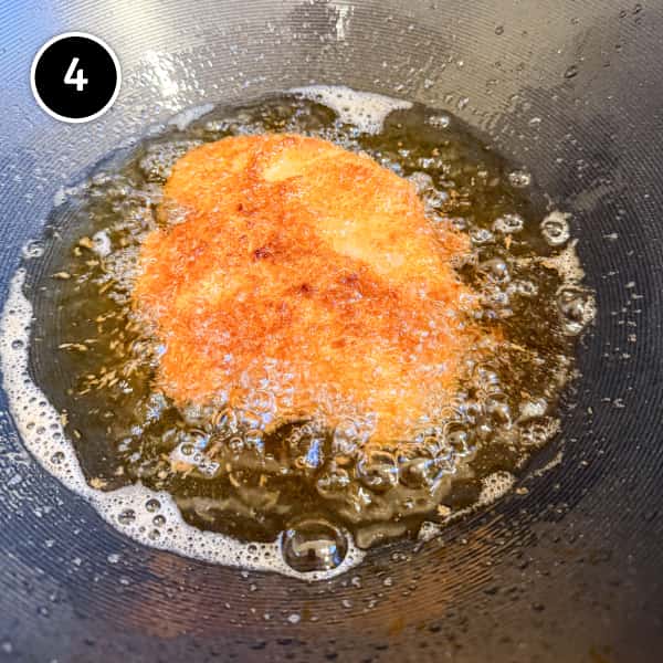 Chicken Katsudon | cookeatworld.com Chicken katsu frying in oil