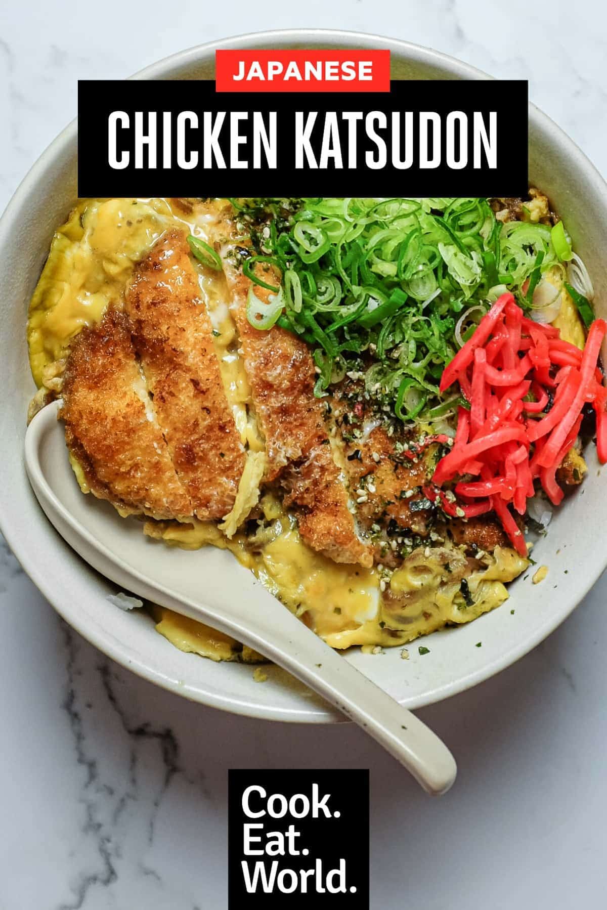 Close-up of chicken katsudon showing tender egg, crispy katsu and fluffy Japanese rice