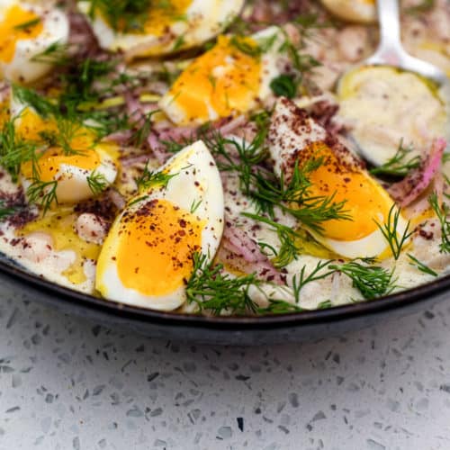 A Turkish bean salad with eggs, onion and dill - Fasulye Piyaz
