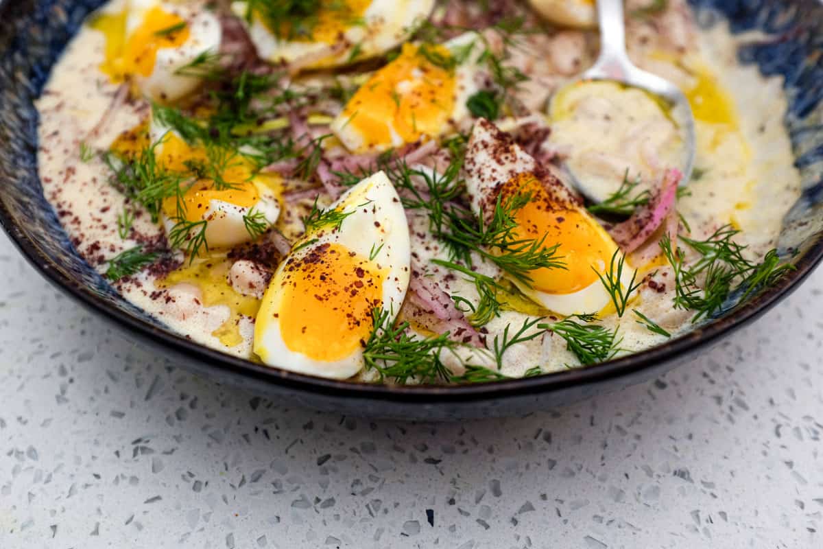 A Turkish bean salad with eggs, onion and dill - Fasulye Piyaz