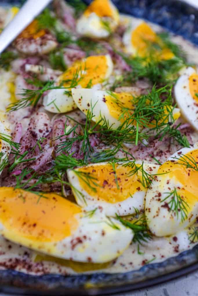 A Turkish bean salad with eggs, onion and dill - Fasulye Piyaz