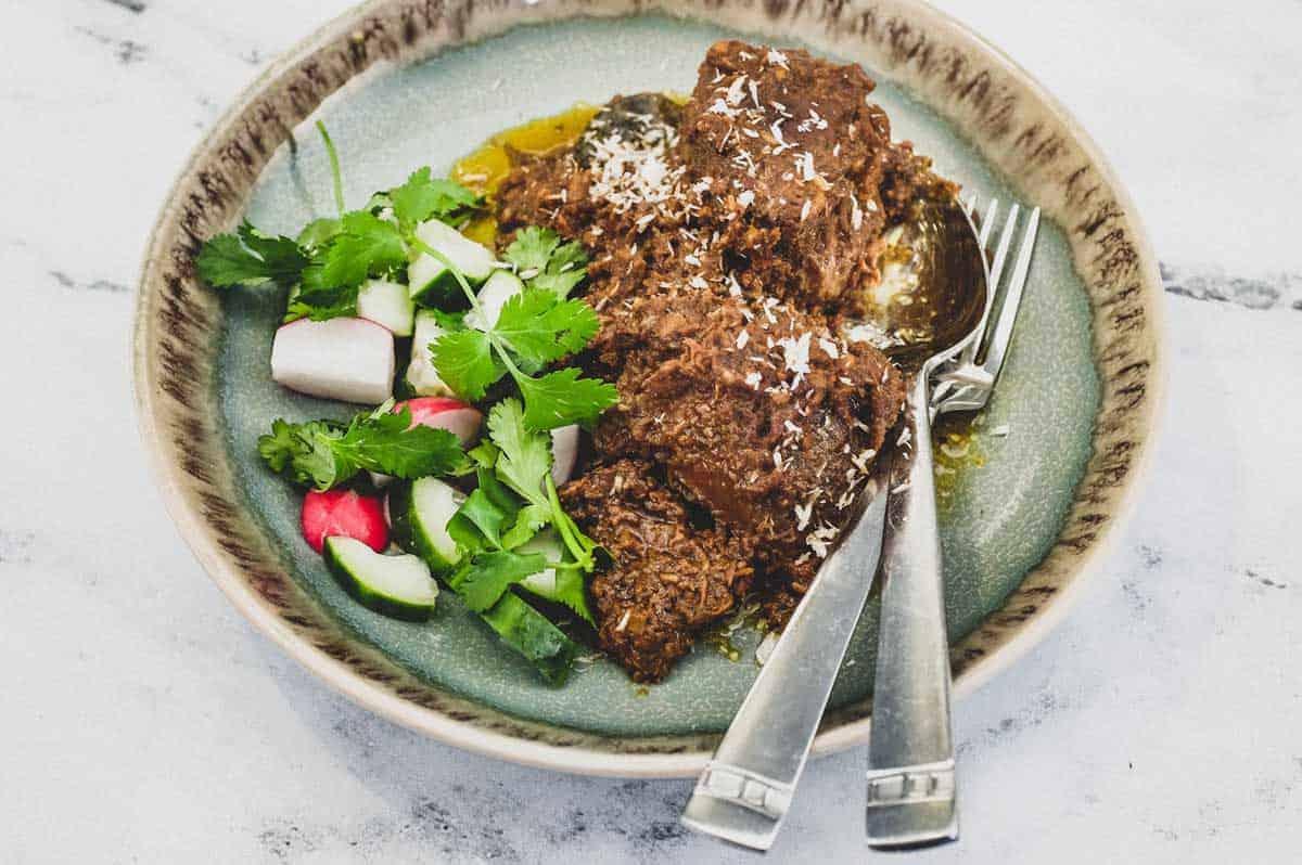 Beef Rendang with salad vegetables