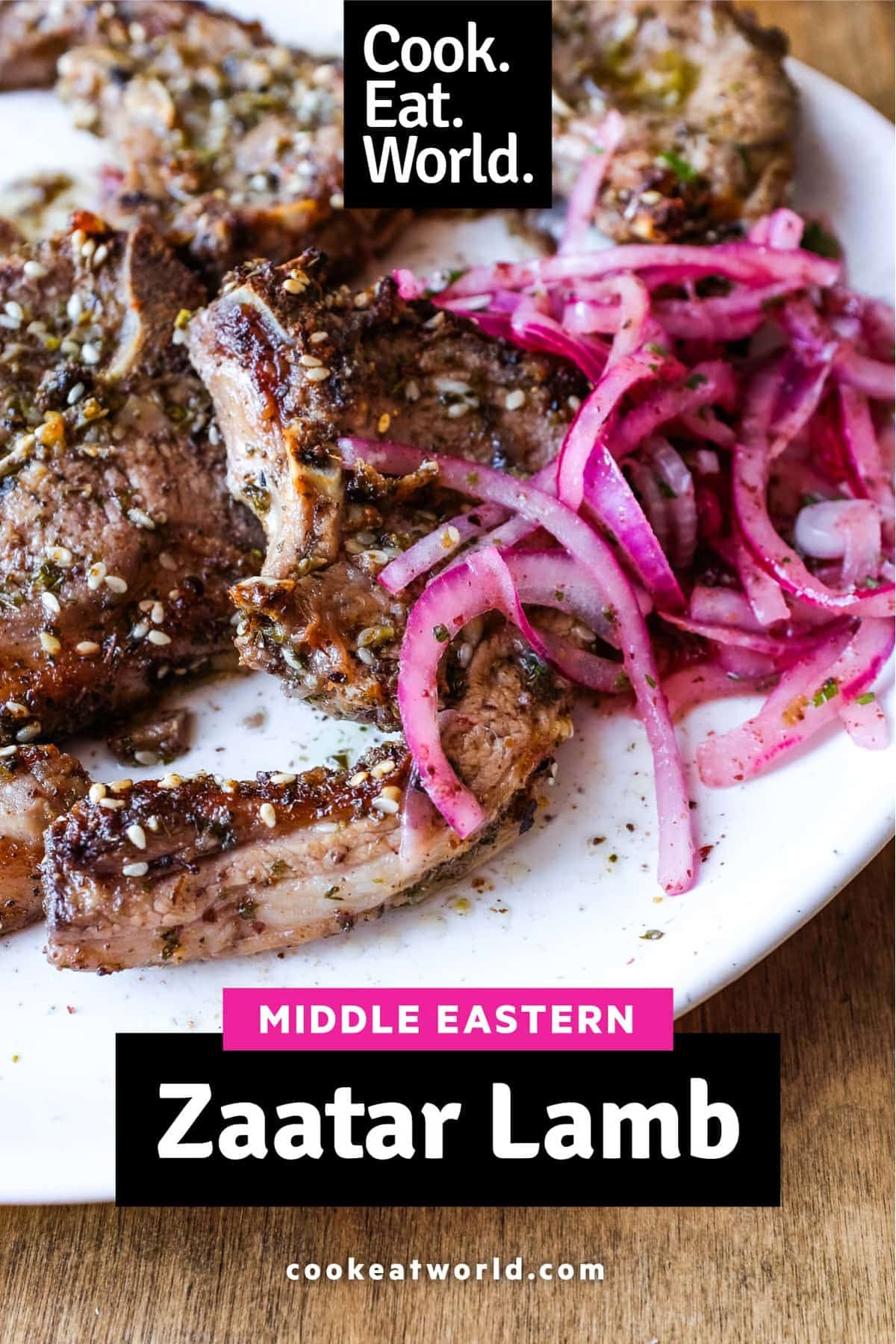 A platter of Zaatar Lamb chops with a side serving of Sumac Onion Salad