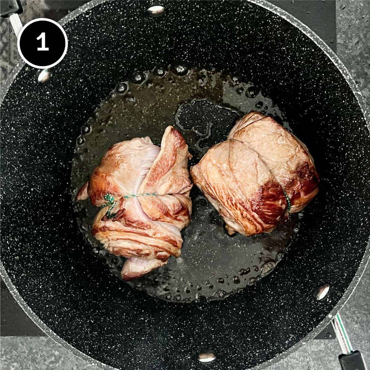 Lamb searing in a pan