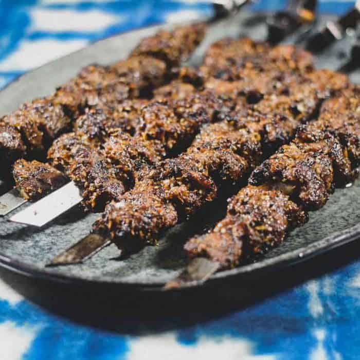Chinese Xinjiang Lamb Skewers on a platter