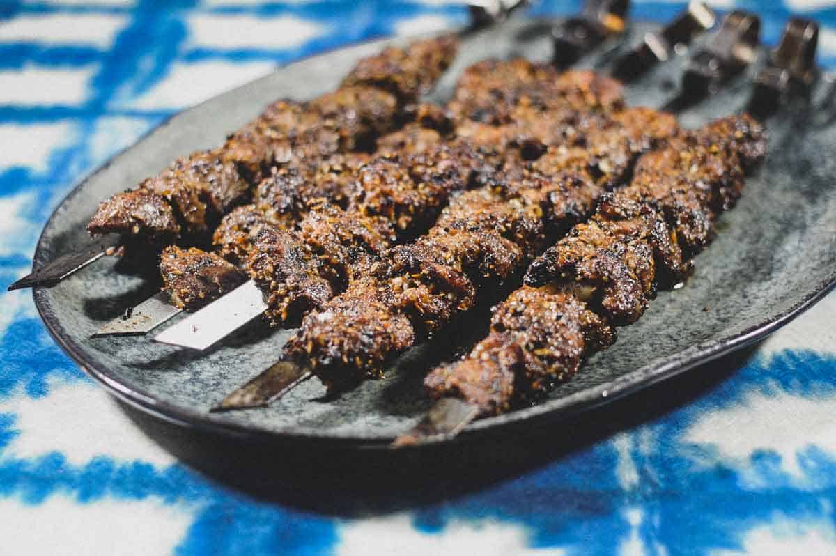 Chinese Xinjiang Lamb Skewers on a platter