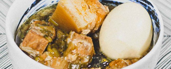 A bowl of Vietnamese Thit Kho (Braised pork belly) with a whole boiled egg