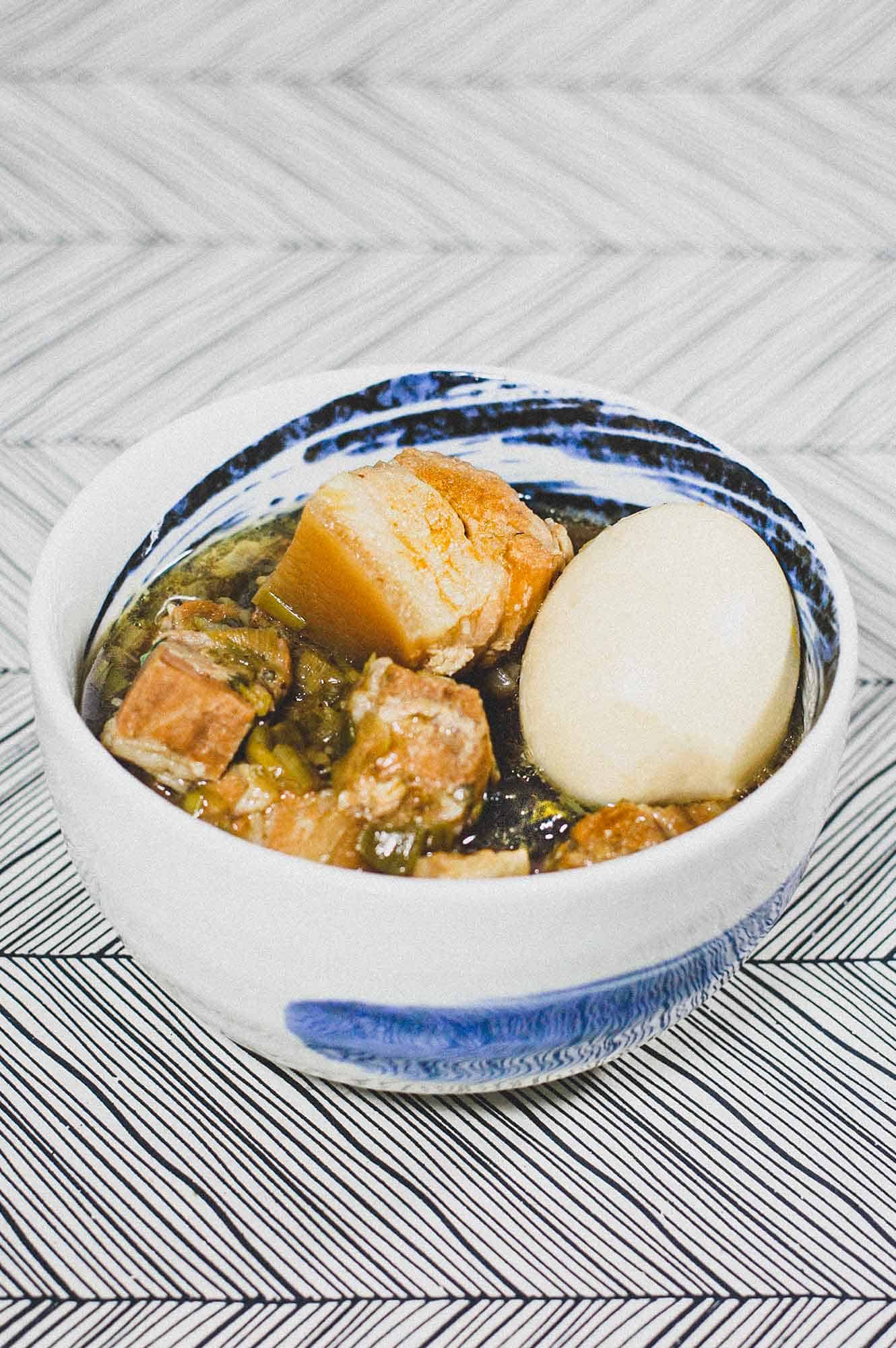 A bowl of Vietnamese Thit Kho (Braised pork belly) with a whole boiled egg