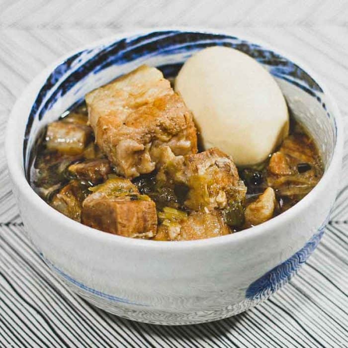 A bowl of Vietnamese Thit Kho (Braised pork belly) with a whole boiled egg