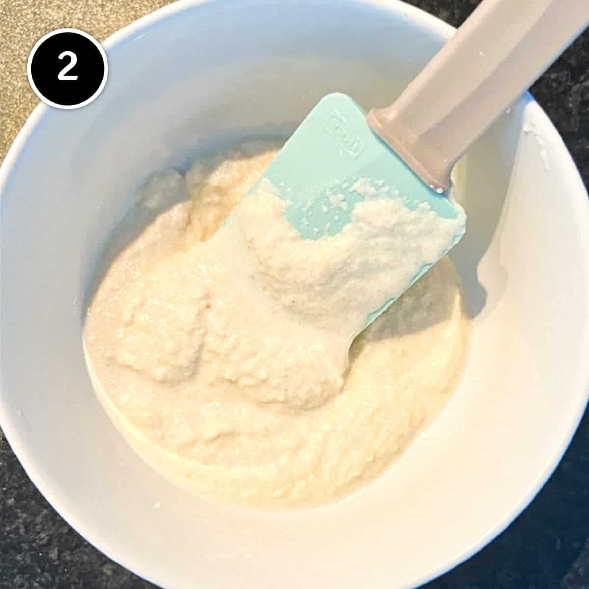 A puree of almond and milk with a spatula