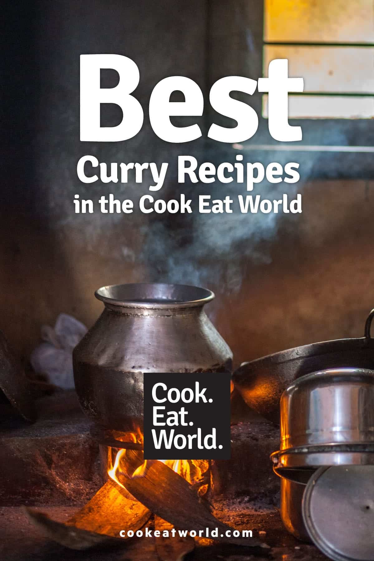 A large silver pot of curry sits over an open flame in Rajasthan India - leading to post about the best curry recipes from www.cookeatworld.com