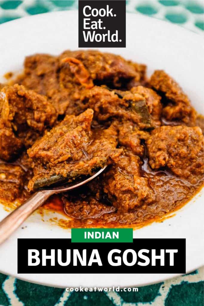 Bhuna Gosht a rich curry in a bowl with a spoon