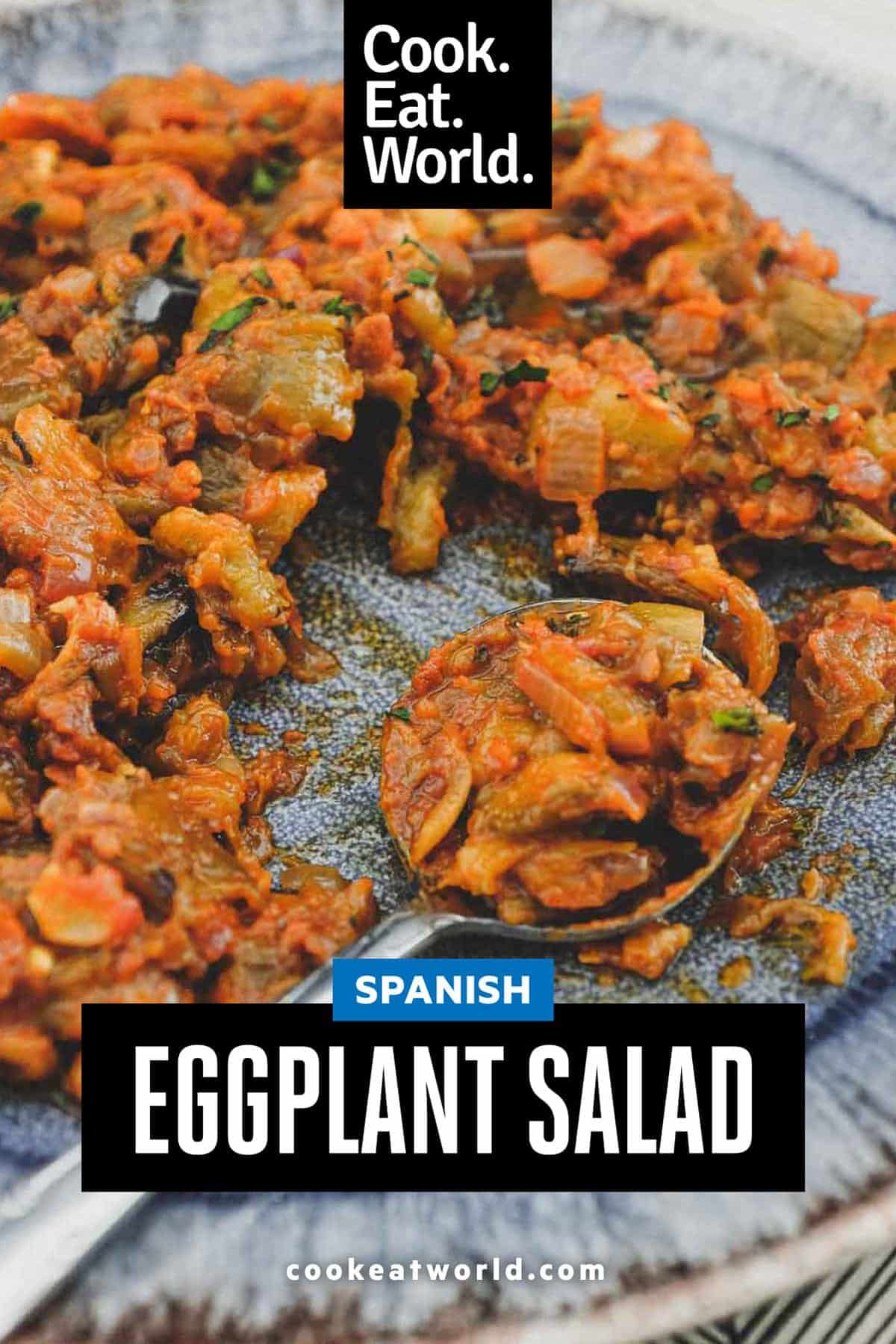 A platter of Spanish Eggplant Salad with a spoon