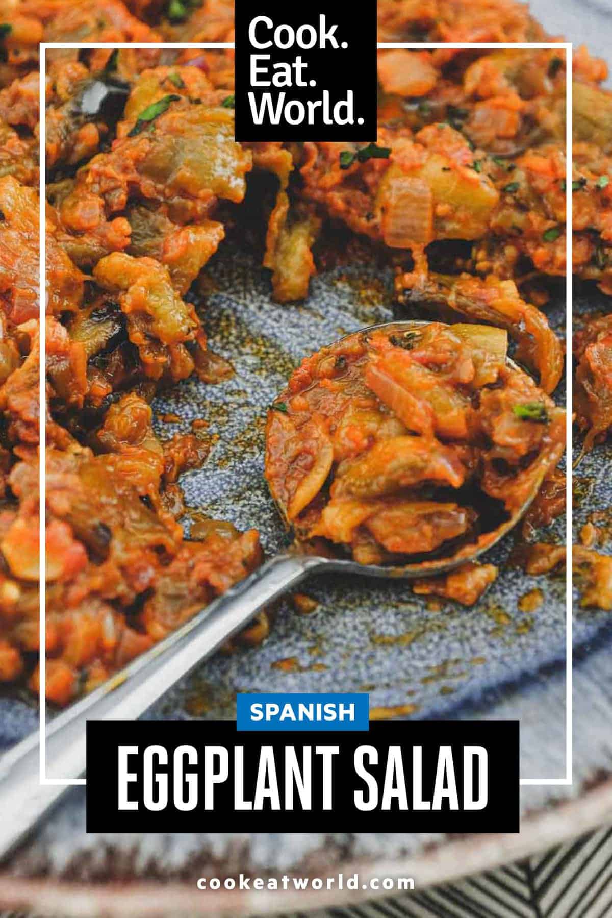 A platter of Spanish Eggplant Salad with a spoon