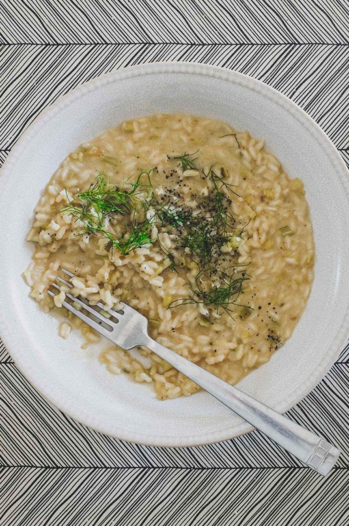 Fennel Risotto in a small bowl with a fork