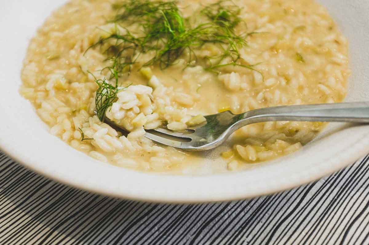 Fennel Risotto in a small bowl with a fork