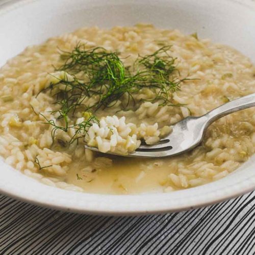 Fennel Risotto in a small bowl with a fork