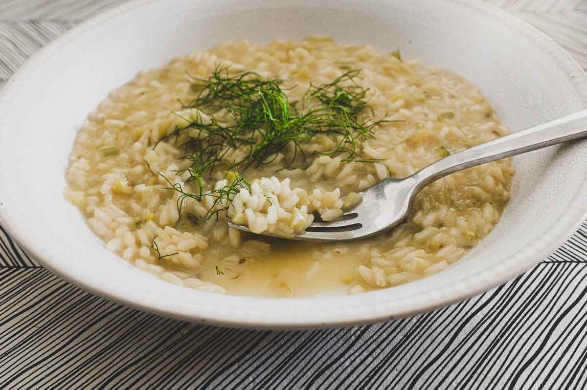 Fennel Risotto in a small bowl with a fork