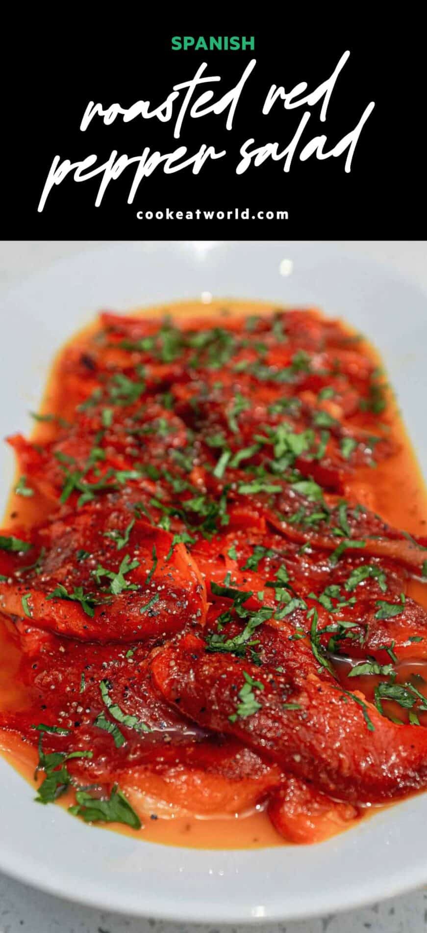 A platter of roasted red peppers, garnished with fresh herbs