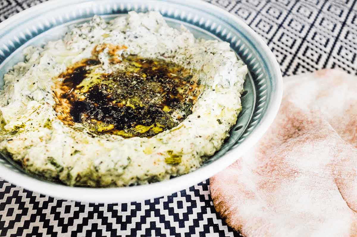 Zucchini cooked and mixed with yoghurt, tahini and middle eastern spices.