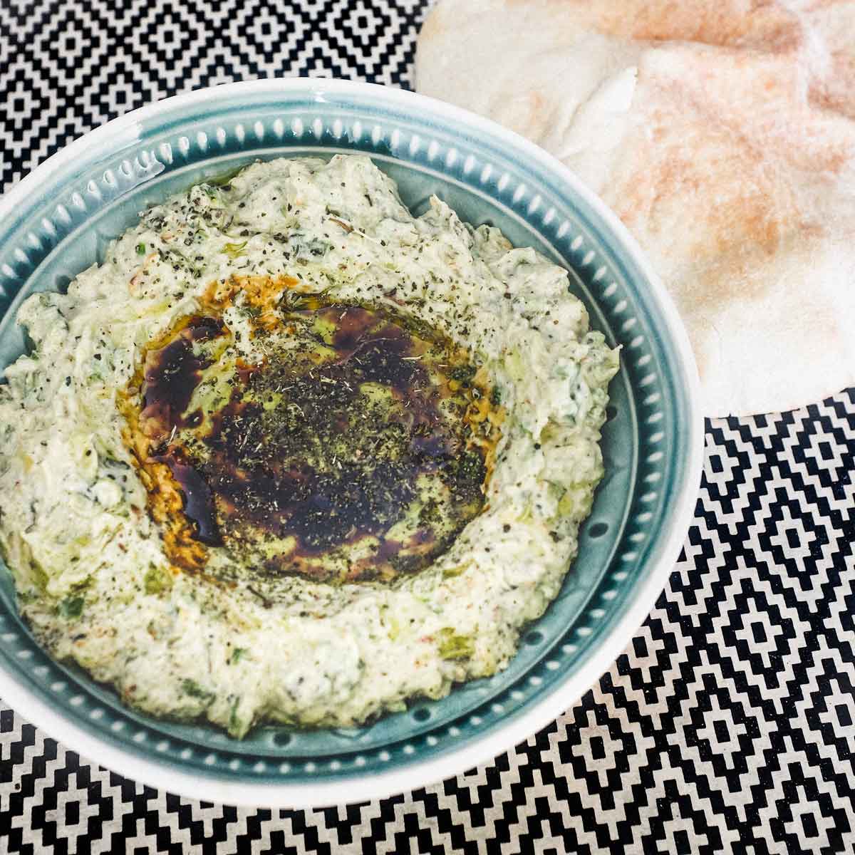 Zucchini cooked and mixed with yoghurt, tahini and middle eastern spices.