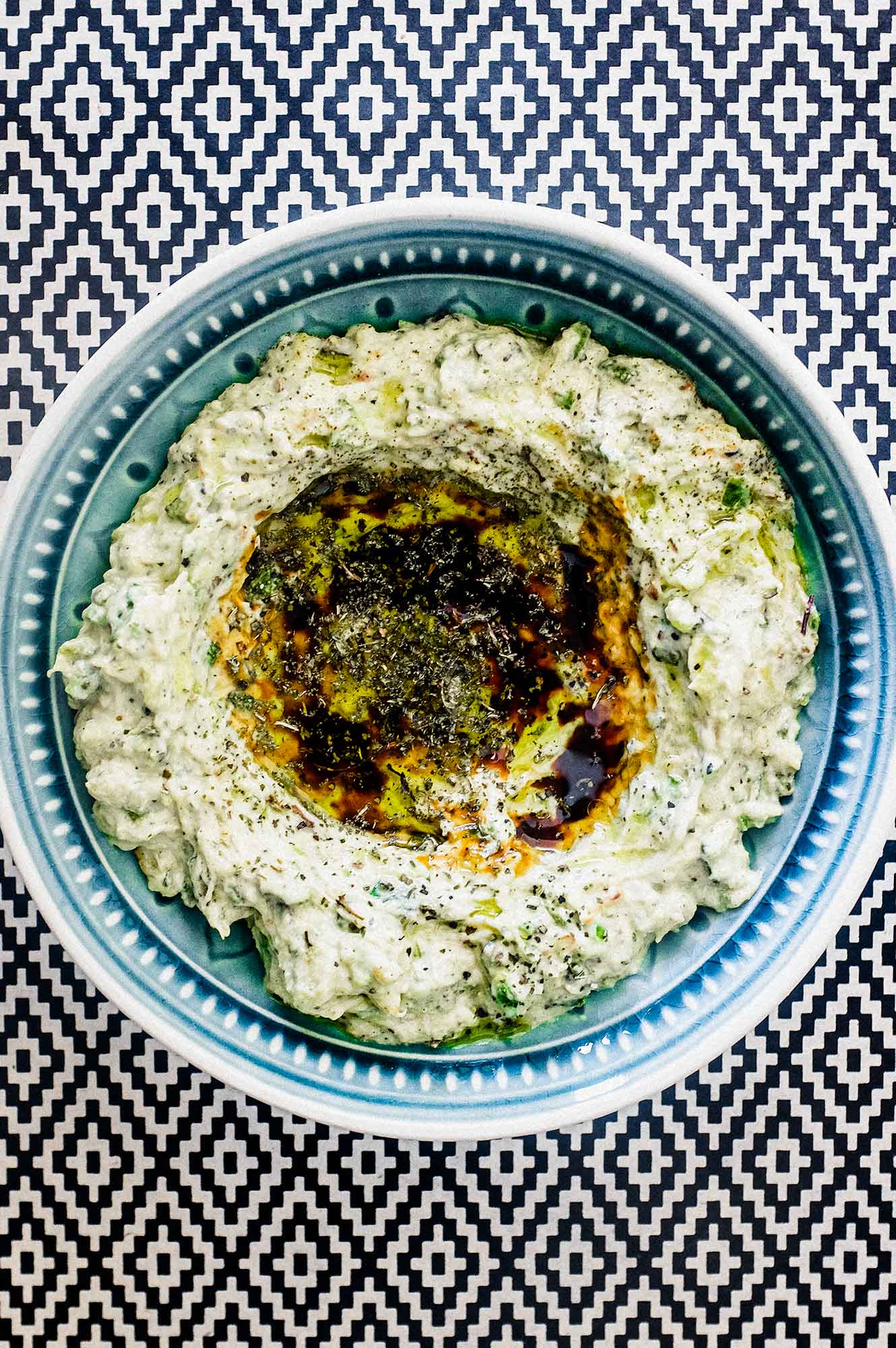 Zucchini cooked and mixed with yoghurt, tahini and middle eastern spices.