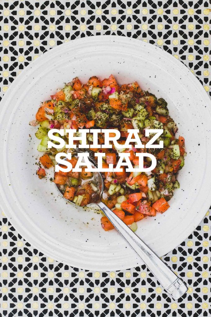 Shirazi Salad - a combination of tomatoes, onion and cucumber scattered with dried mint