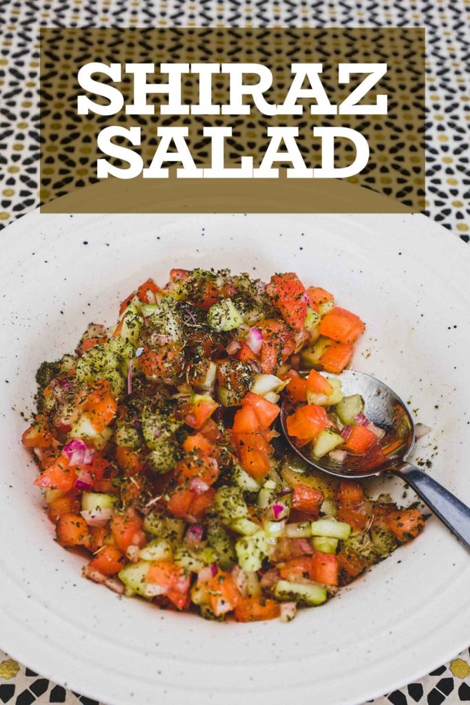 Shirazi Salad - a combination of tomatoes, onion and cucumber scattered with dried mint
