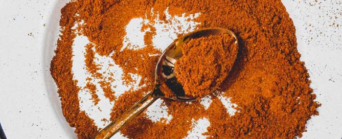 A combination of spices form a bright red Malaysian Curry Powder