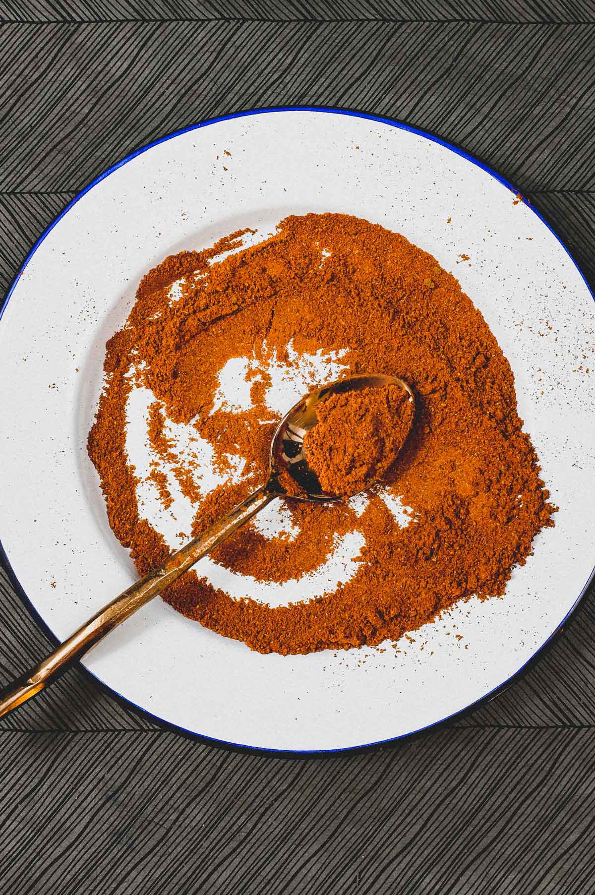 A combination of spices form a bright red Malaysian Curry Powder