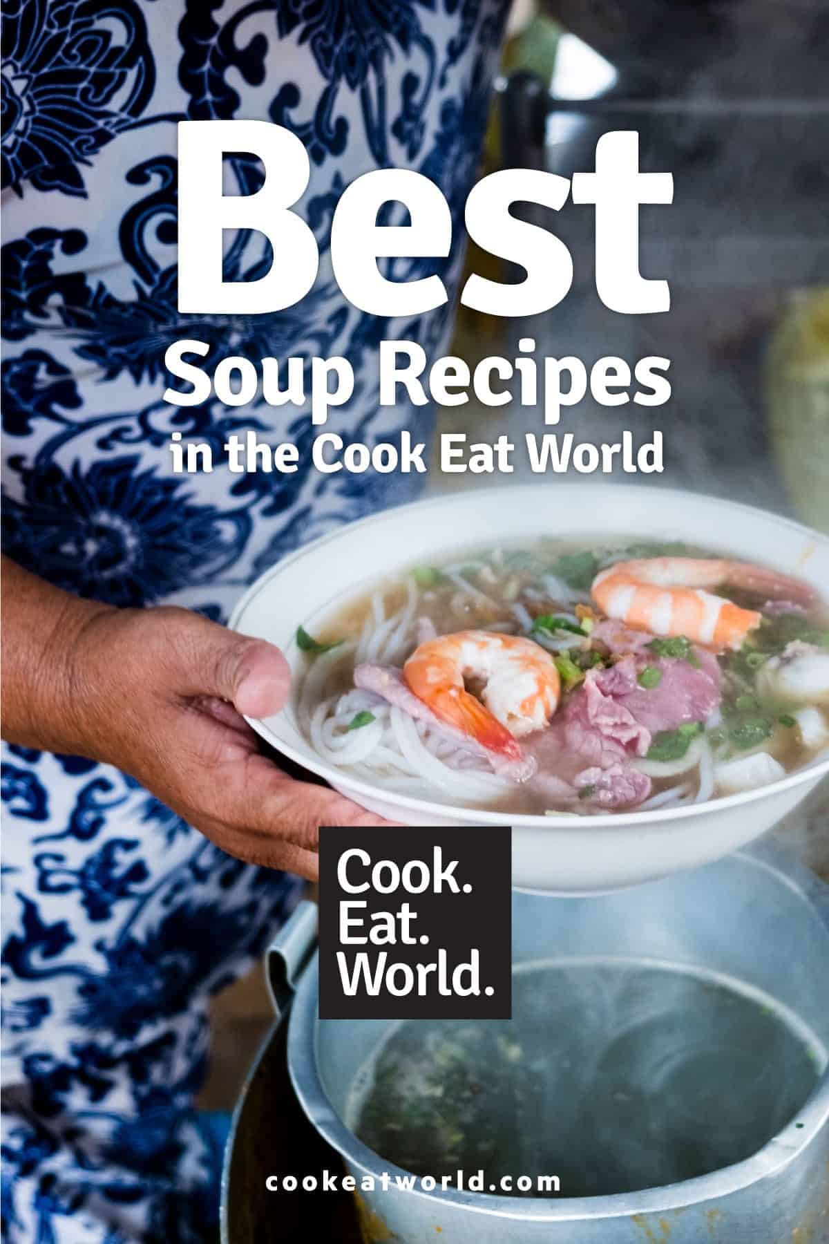 A close up photograph of a Vietnamese woman holding a bowl of Pho Soup with shrimp, beef and noodles - leading to a post about the best soup recipes from cookeatworld.com