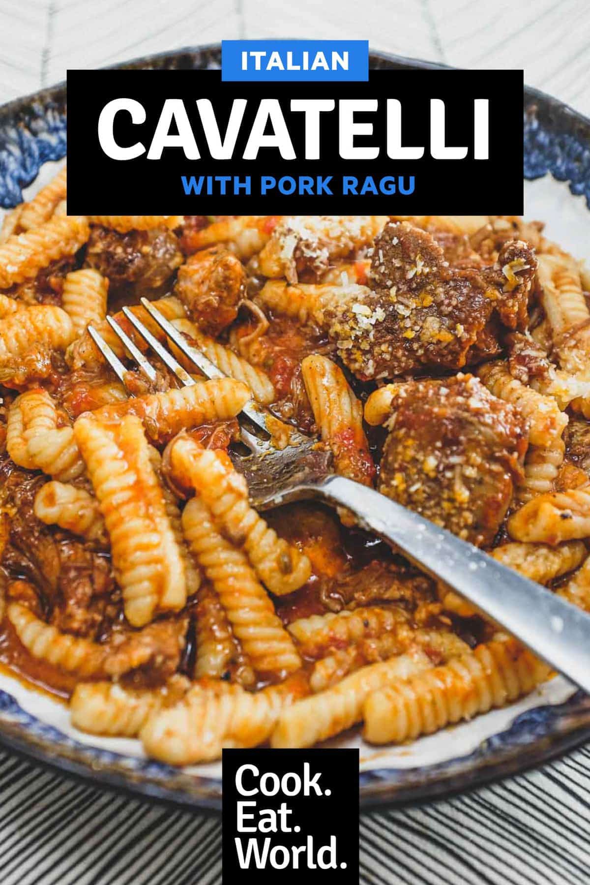 A bowl of cavatelli pasta with pork rag&ugrave; with a fork