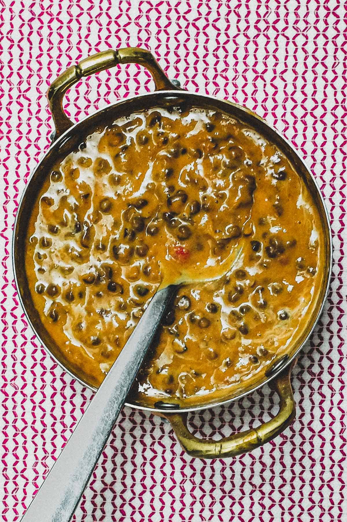 A small pan of dal akahani - lentil curry