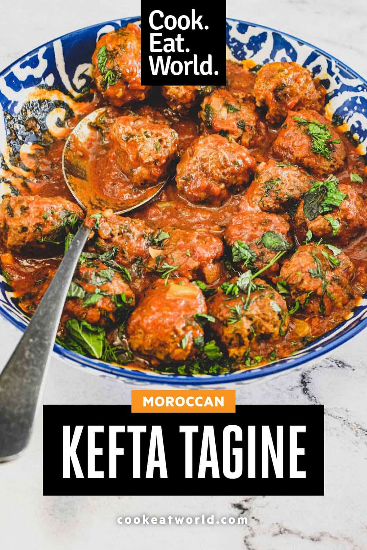 A large bowl of Moroccan Kefta (meatballs) tagine with a spoon.