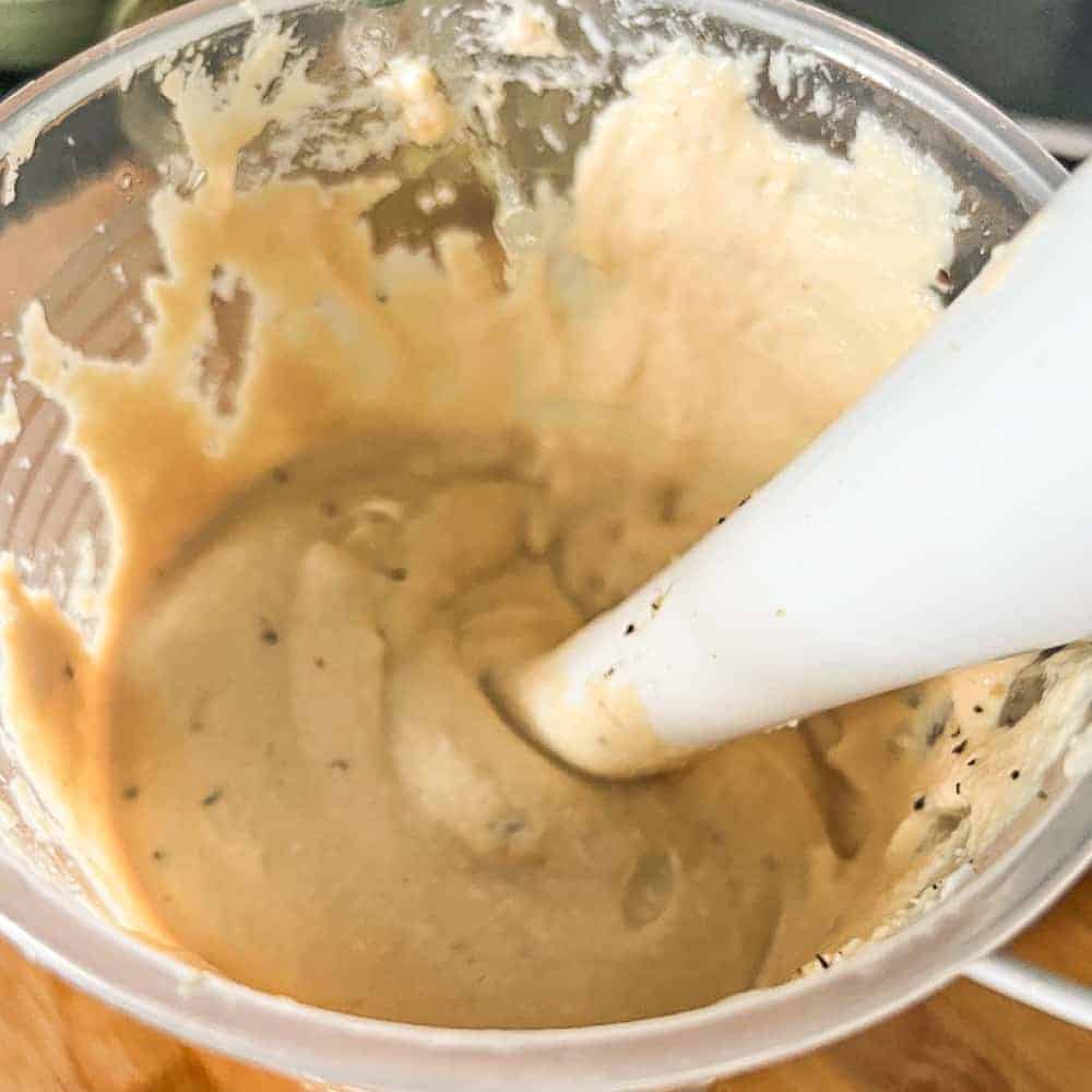 Tonnato sauce being blended in a jug