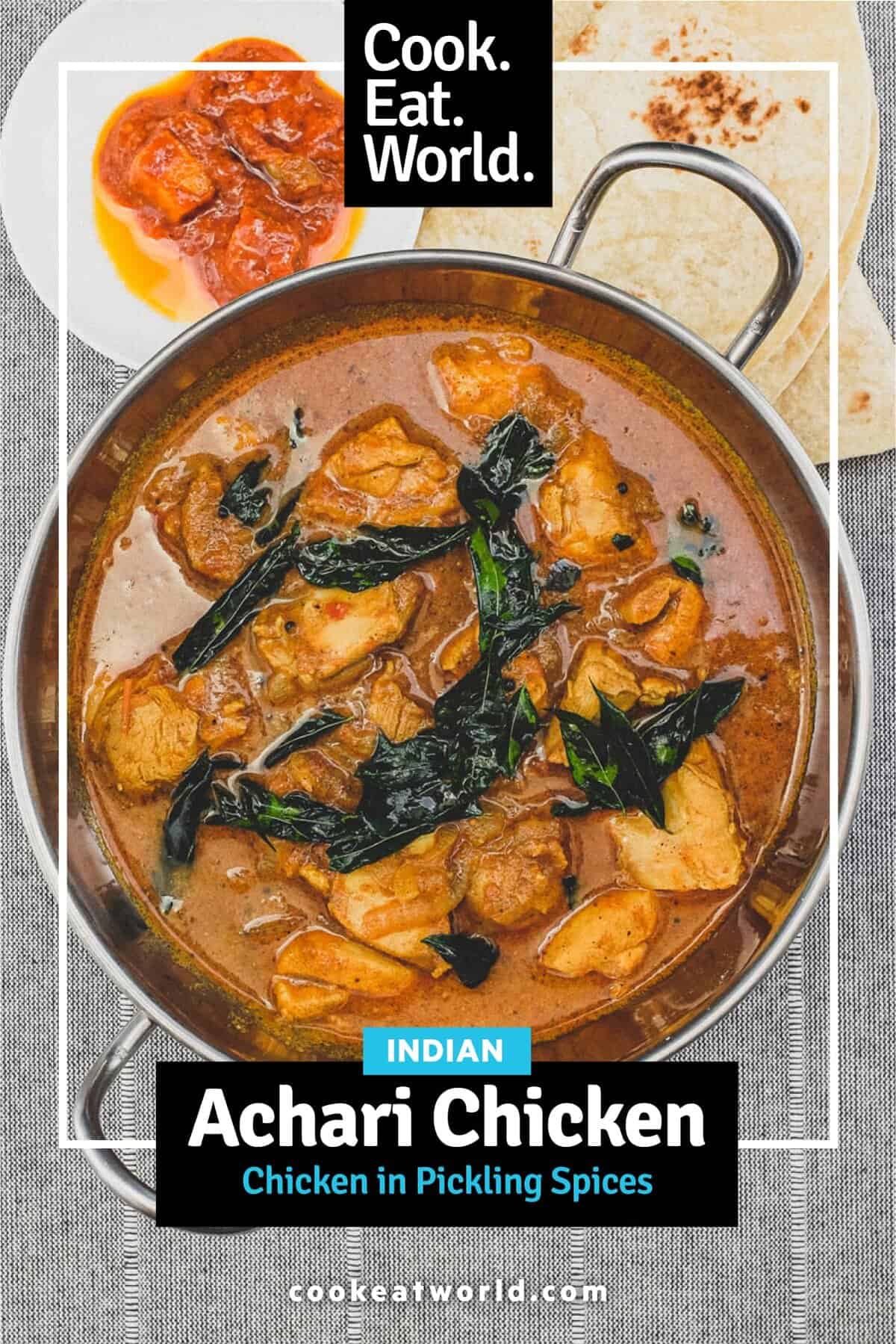 Achari Chicken in a silver bowl scattered with fried curry leaves