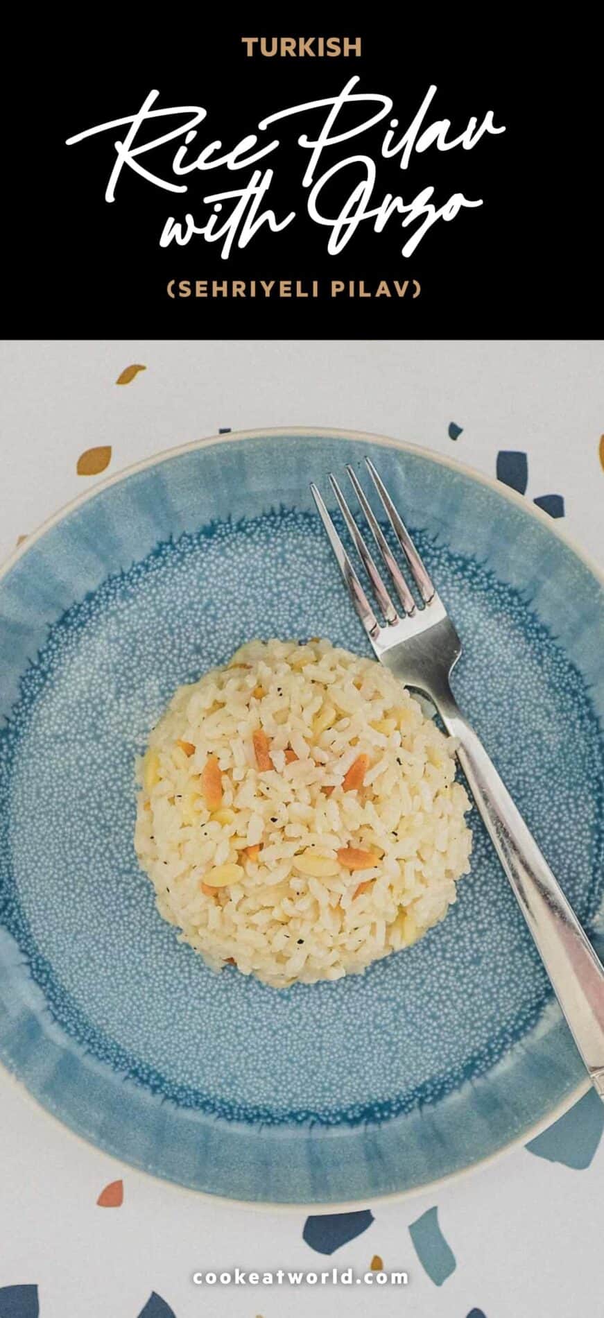 A plate with a dome of Turkish rice pilav and a fork.
