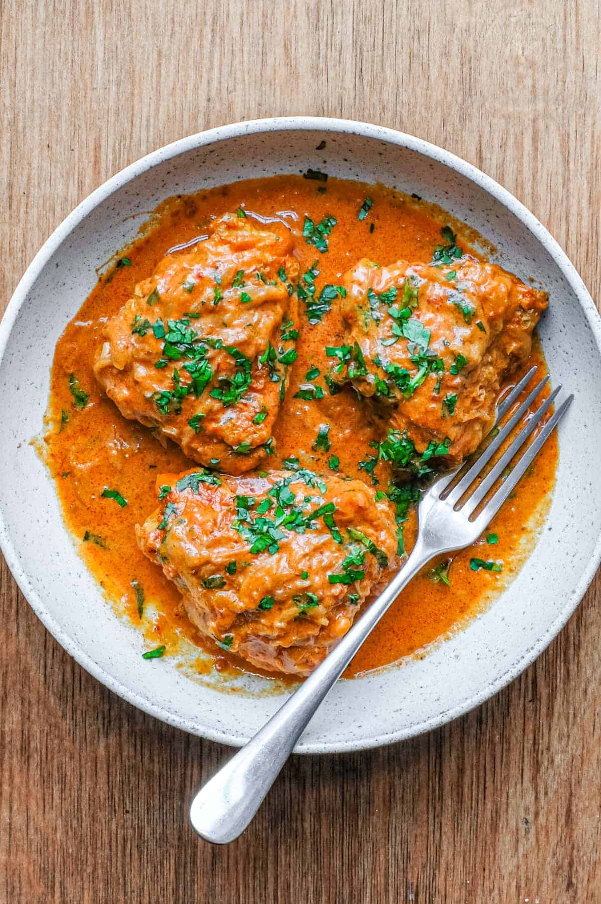 A bowl of Mexican chipotle chicken with a fork