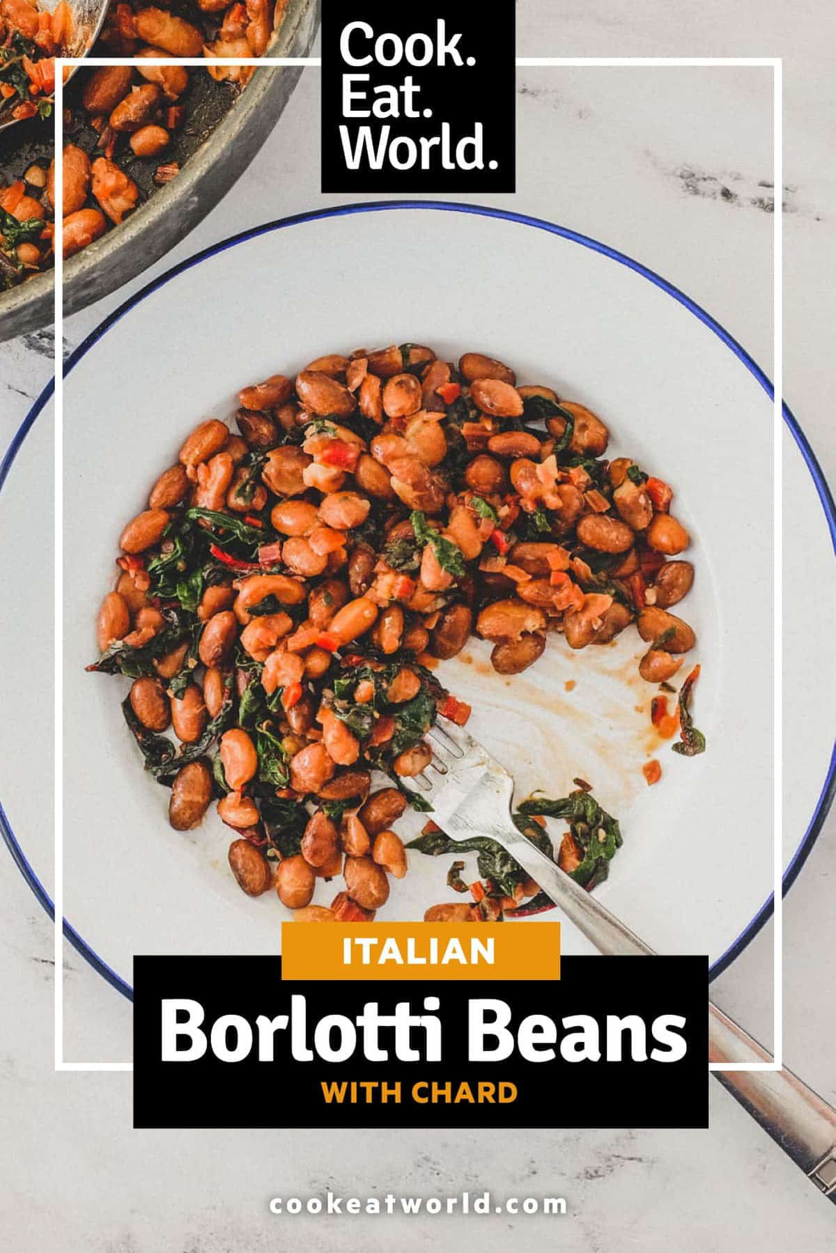 Borlotti beans cooked with chard (silverbeet) on a plate with a fork