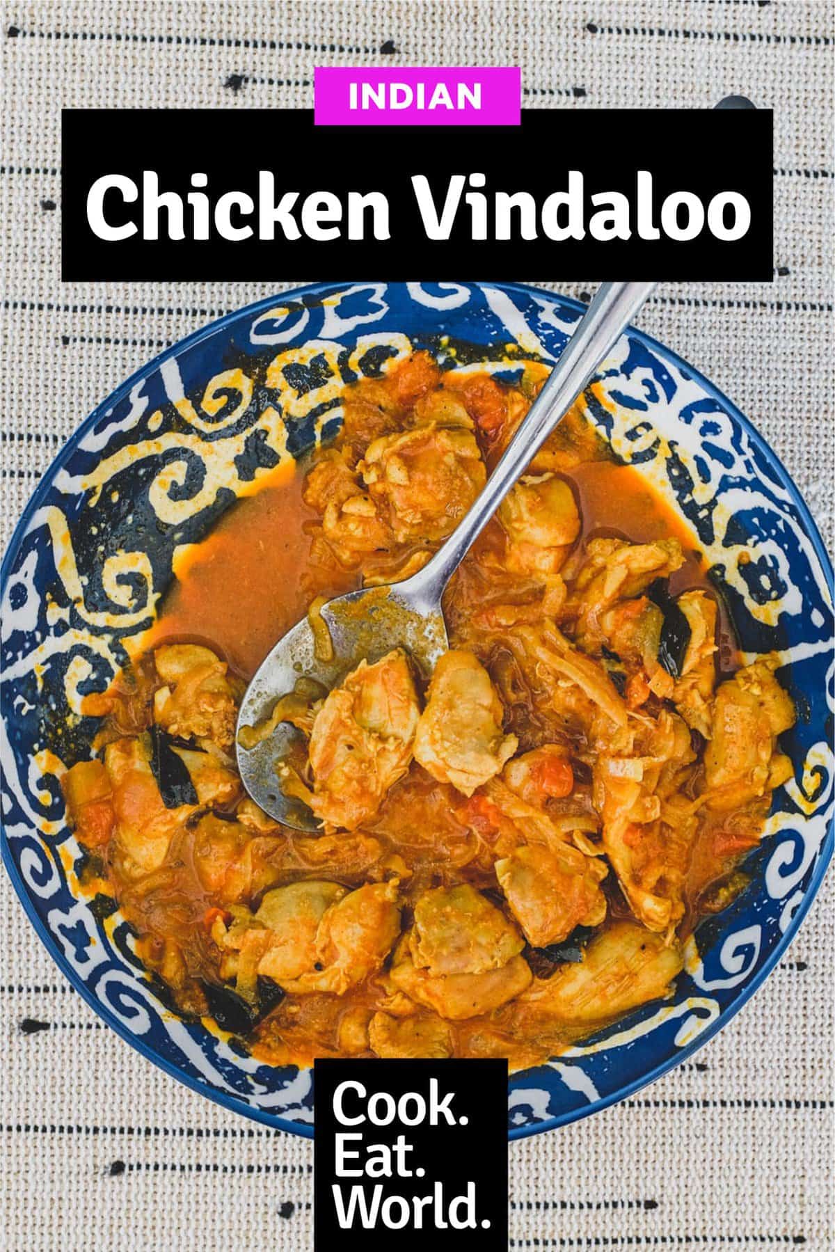 Chicken cooked with vinegar. spices, garlic and tomato.