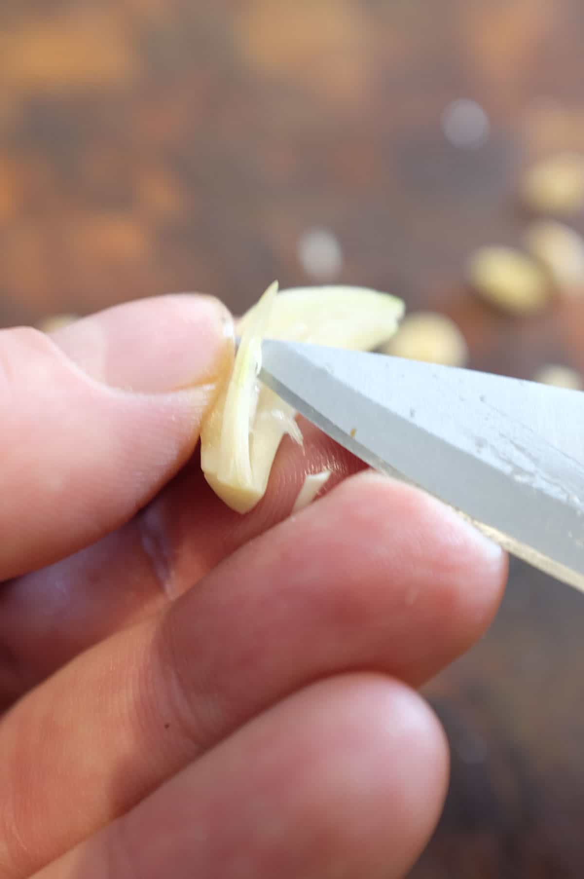 Removing the centre 'germs' of a garlic clove