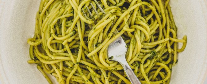 A bowl of spaghetti mixed with Pesto Genovese