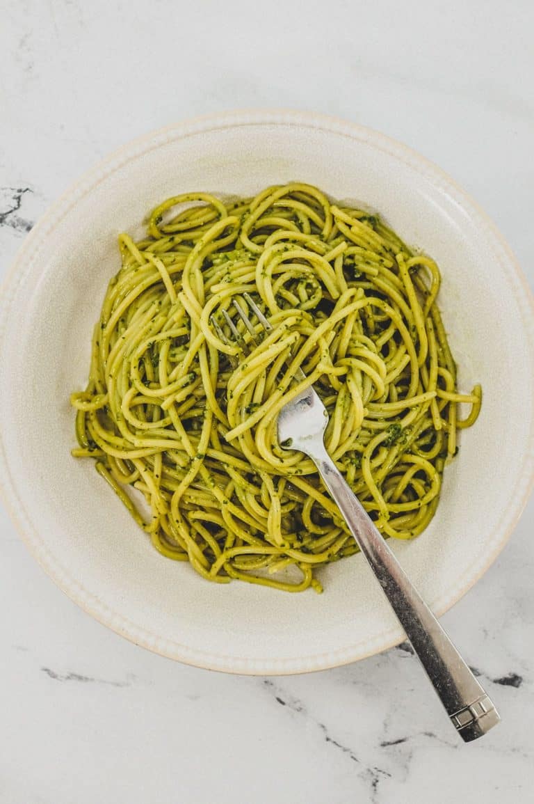 A bowl of spaghetti mixed with Pesto Genovese