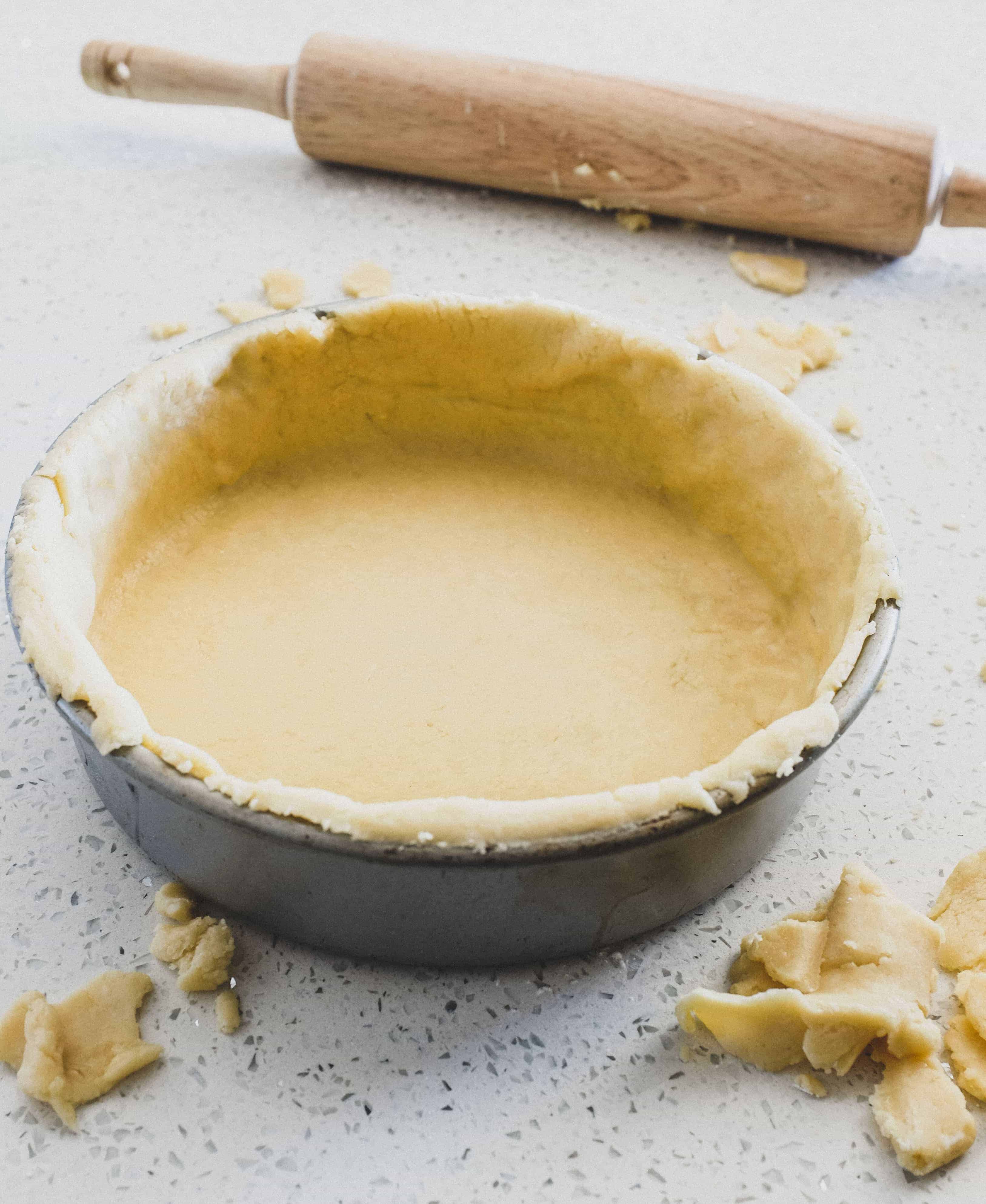 Sweet pastry dough in a baking tin for an Italian Ricotta Pie