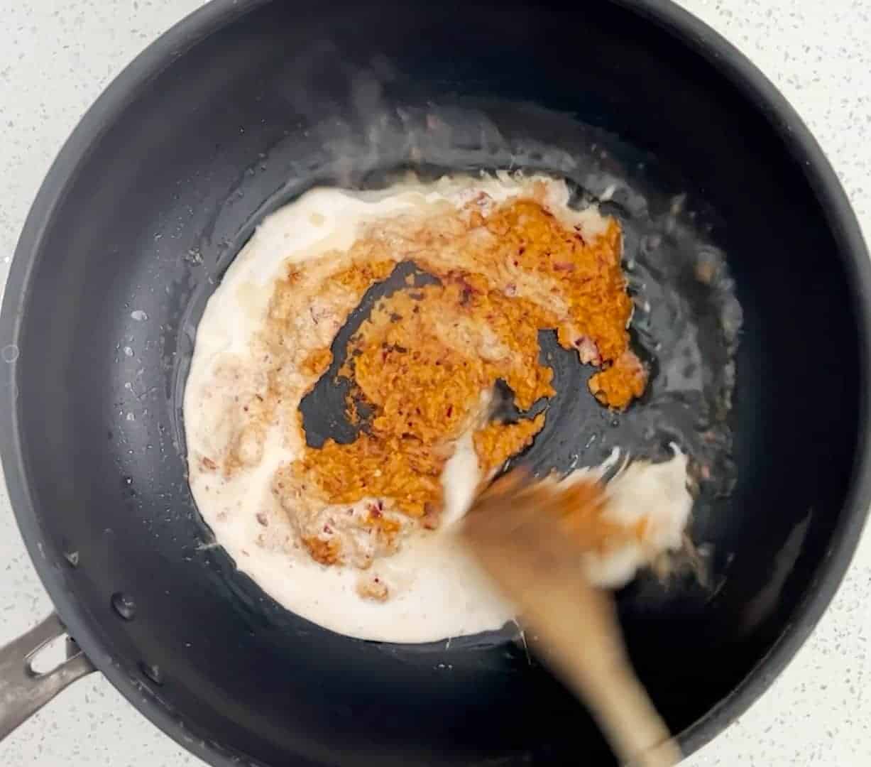 How to make Ayam Masak Merah - Fry the tempeh with coconut milk